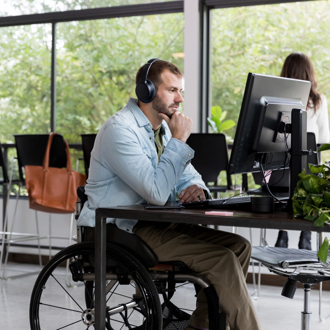 IT-Support-Man-in-Wheelchair-at-Computer